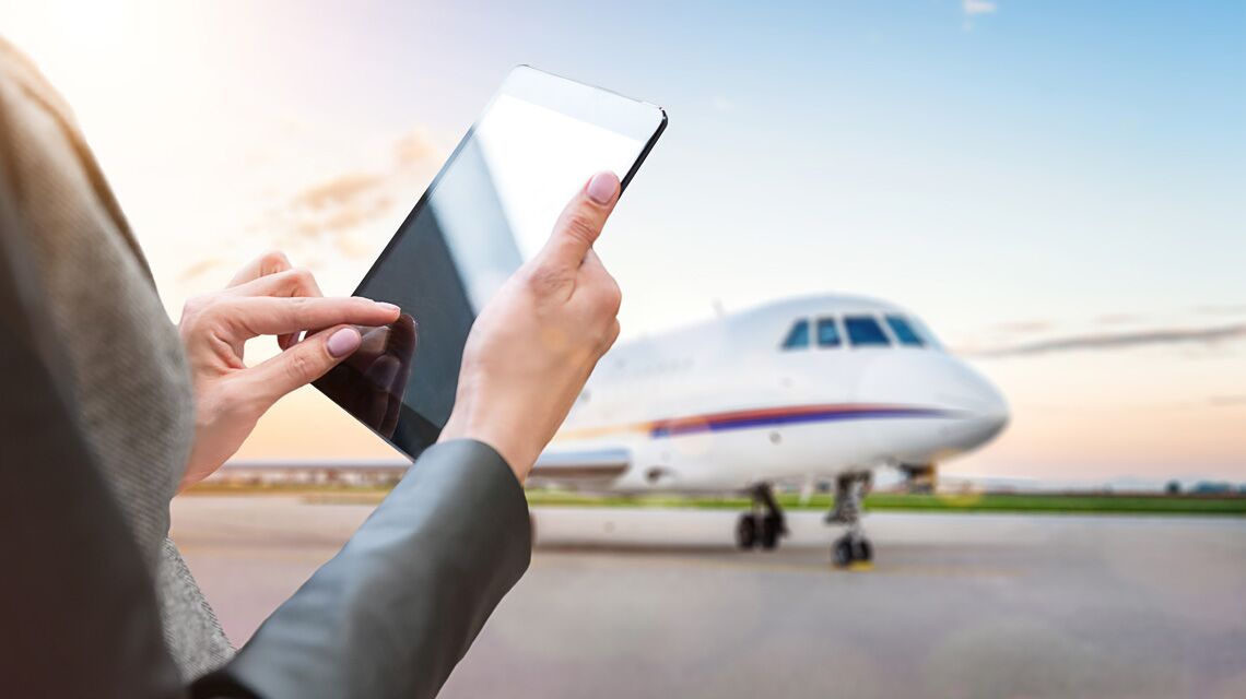 A crew member choosing schedule preferences on a tablet